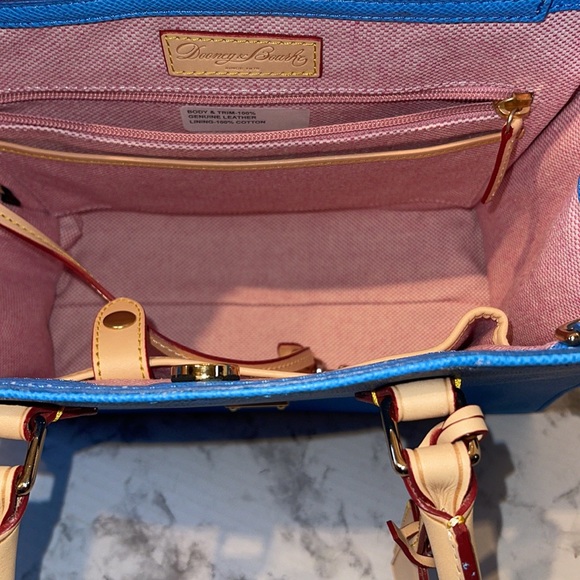 Dooney & Bourke handbag with shoulder strap, key chain, and small coin holder. - Picture 8 of 16